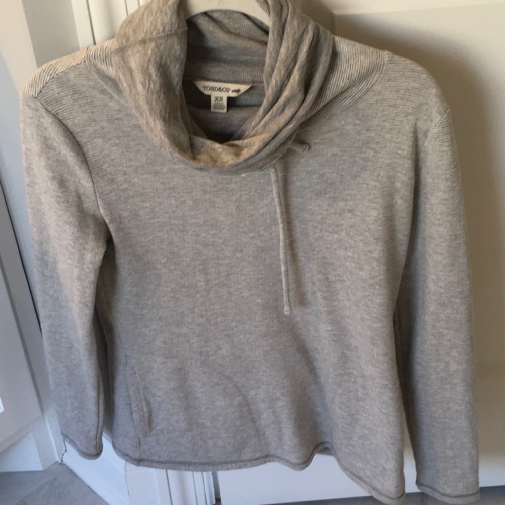 Toad&Co Spring Pullover with funnel neck that can be unrolled and worn as a hood